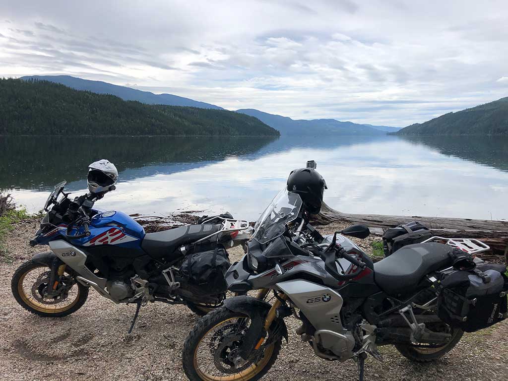 2 bikes parked near the lake